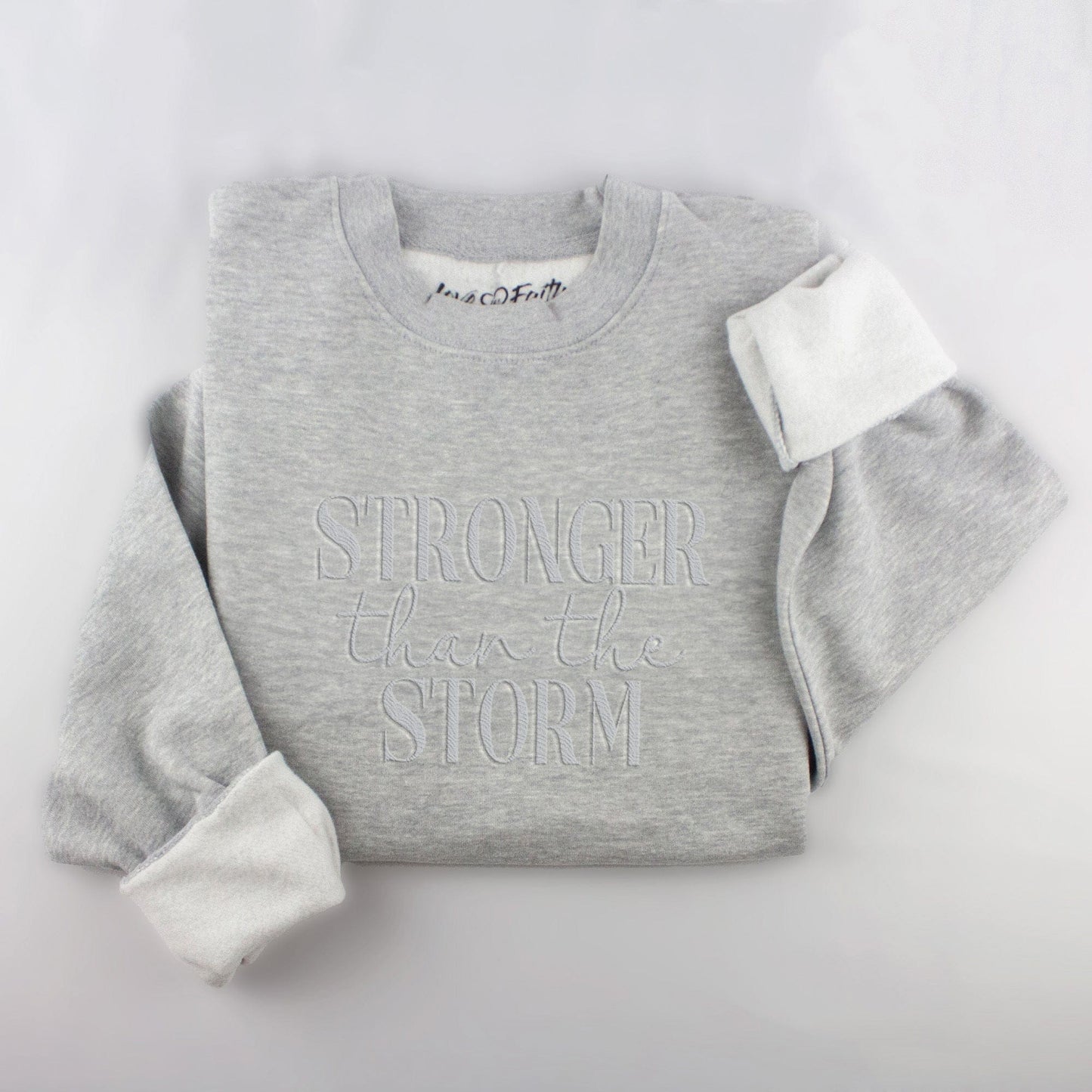 Embroidered Stronger Than The Storm Sweatshirt